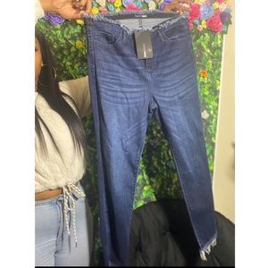 Dark denim distressed jeans